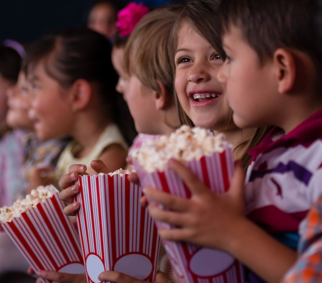 Kids At Cinema Party with popcorn