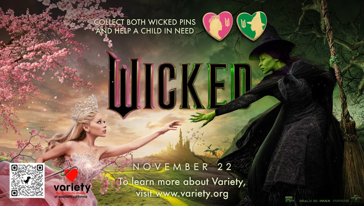  two gold heart pins featuring characters Glinda and Elphaba from WICKED 