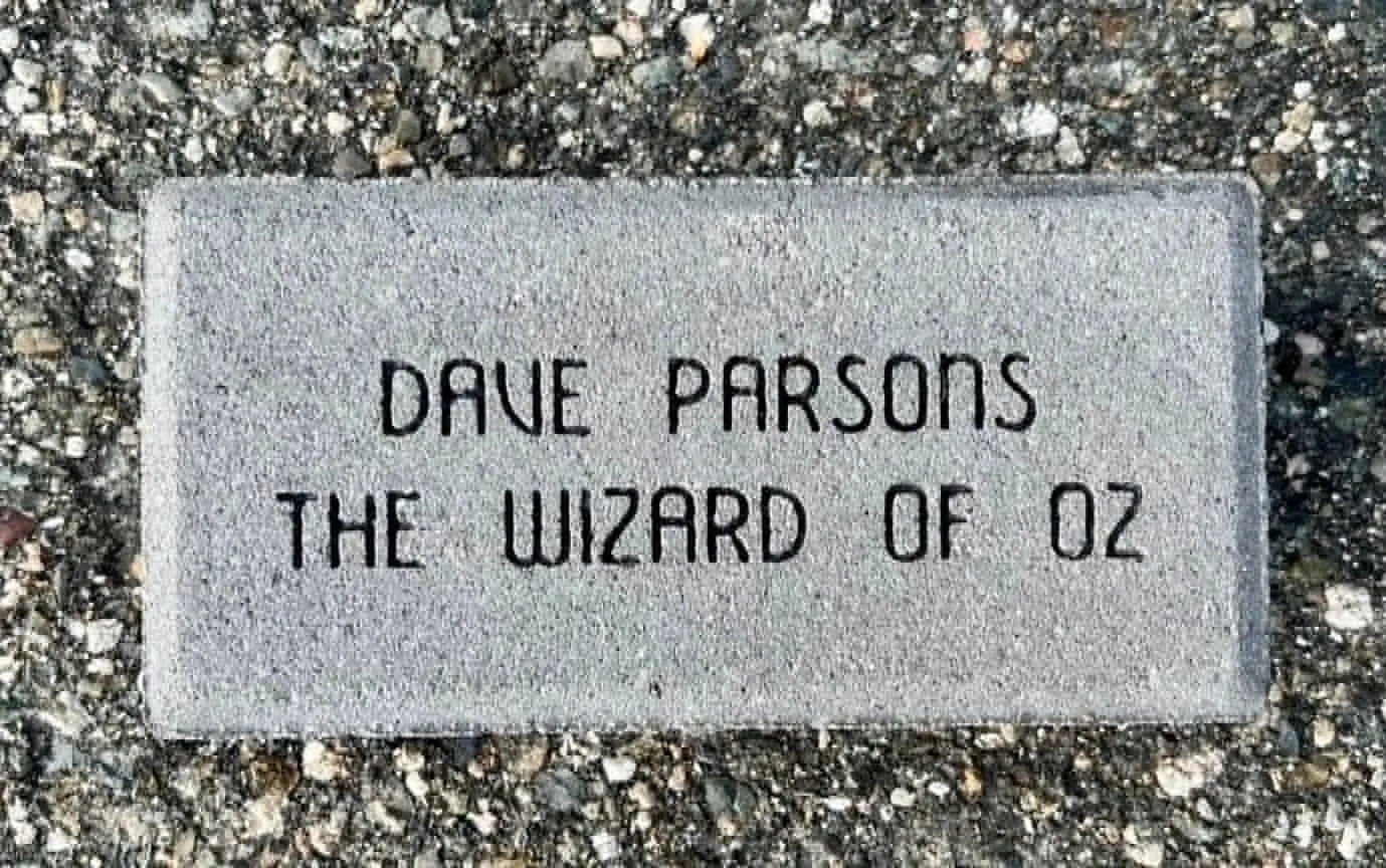 brick with the wording "dave pardsons the wizard of oz"
