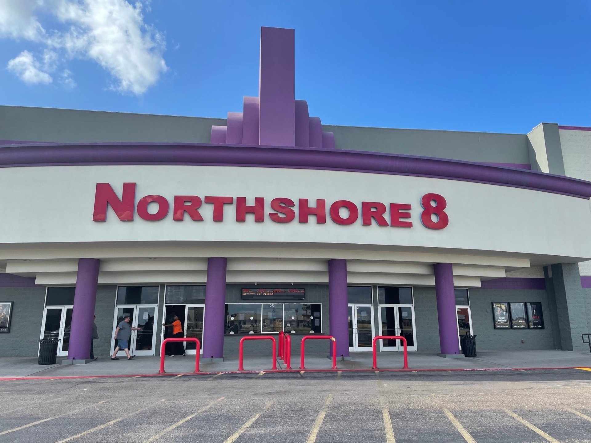 exterior of theatre showing northshore 8 sign