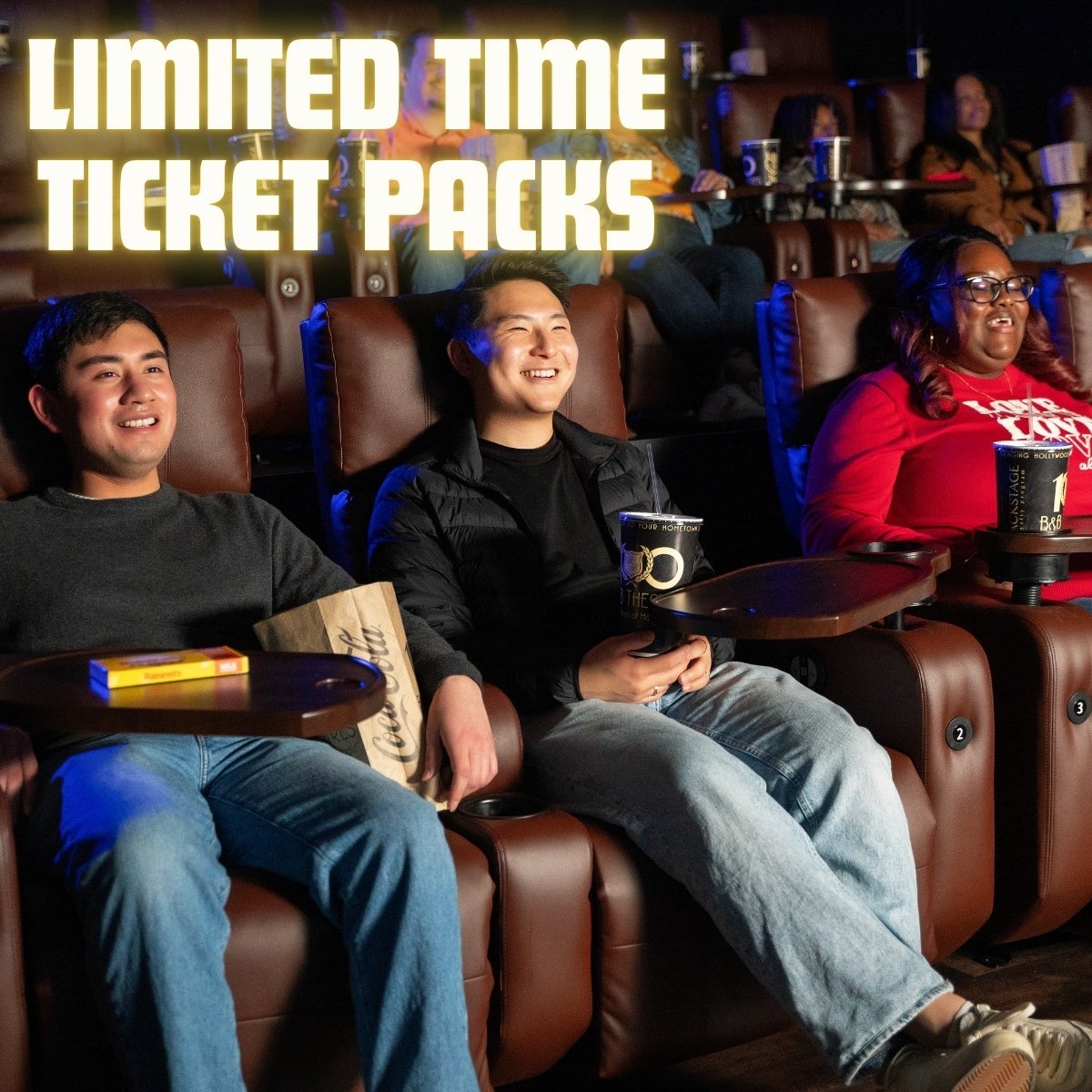 2 men and 1 woman sitting in recliners and smiling