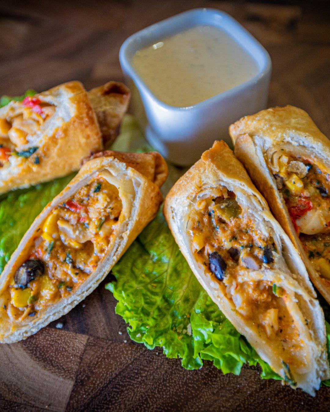 white square bowl filled with rice & bang bang cauliflower bites
