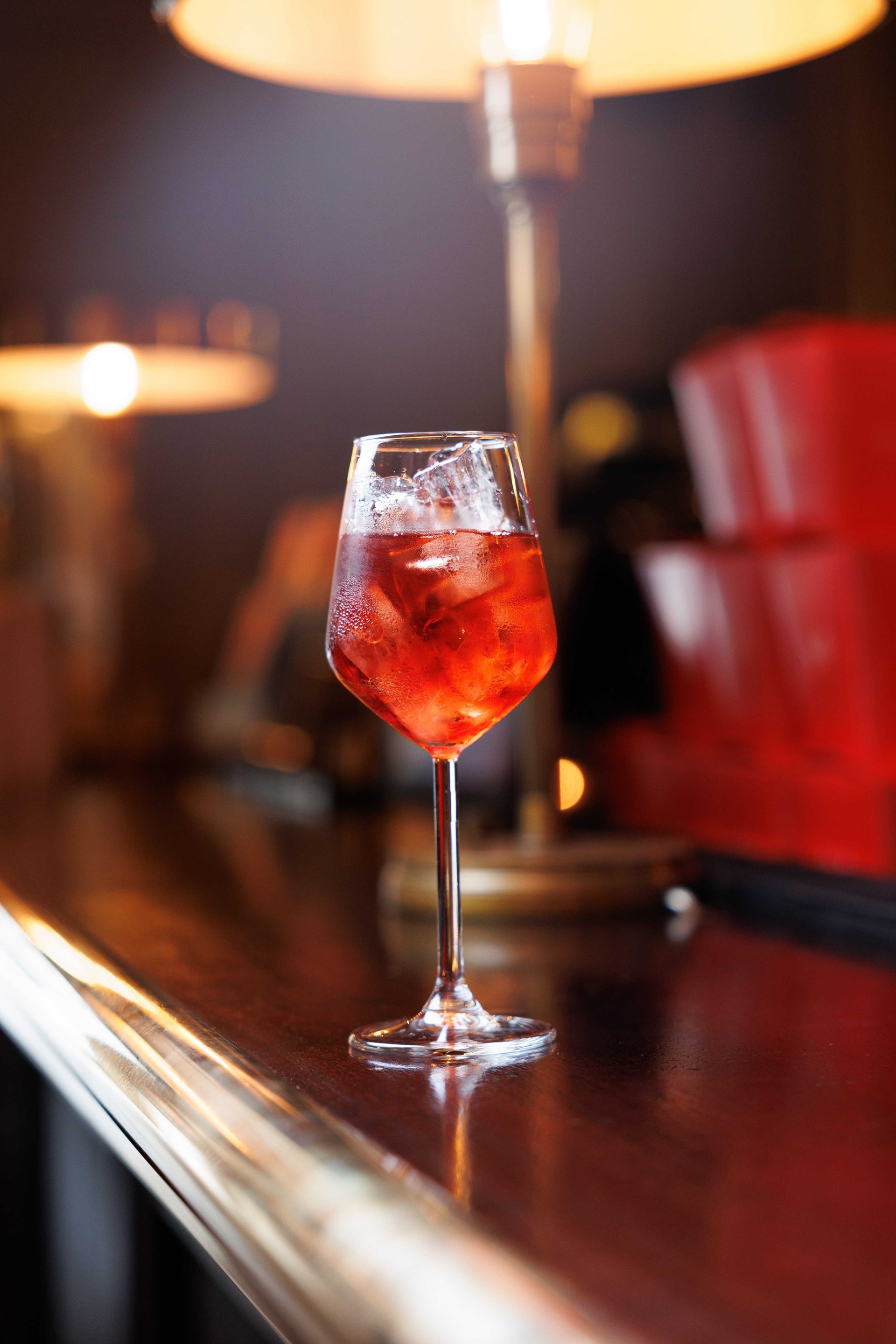A Cocktail sitting on a bar