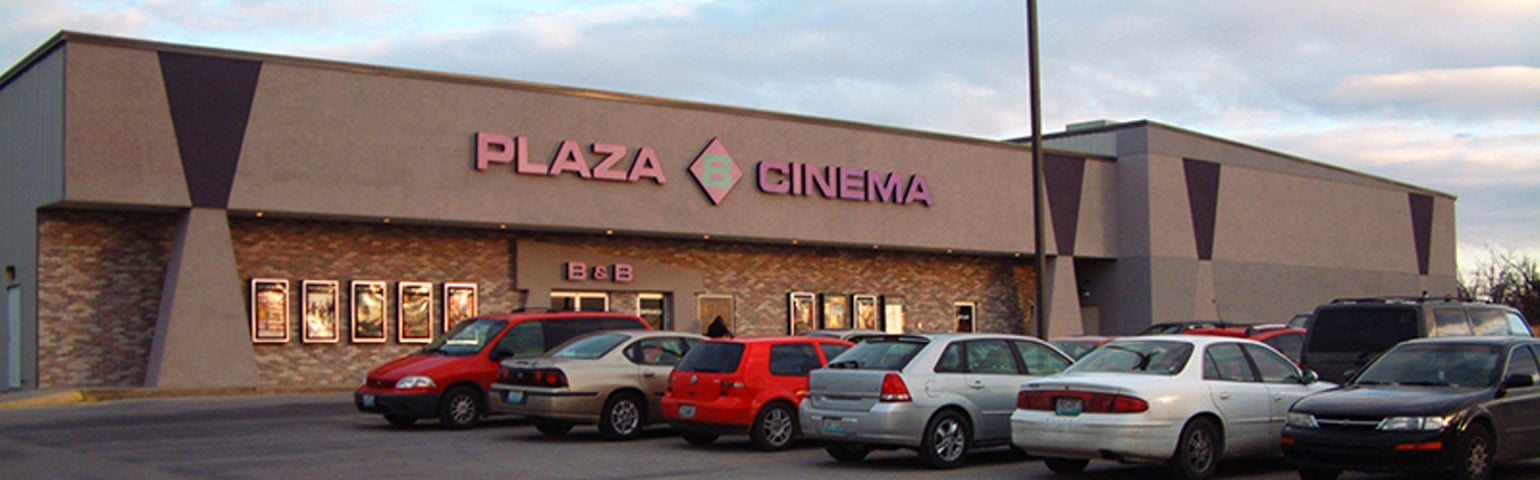 exterior of theatre showing Plaza 8 Cinema sign