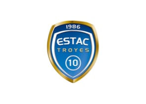 Logo en forme d’écusson bleu et doré de l’ESTAC Troyes, avec l’inscription « 1986 » en haut, « ESTAC TROYES » au centre et le chiffre « 10 » en bas.