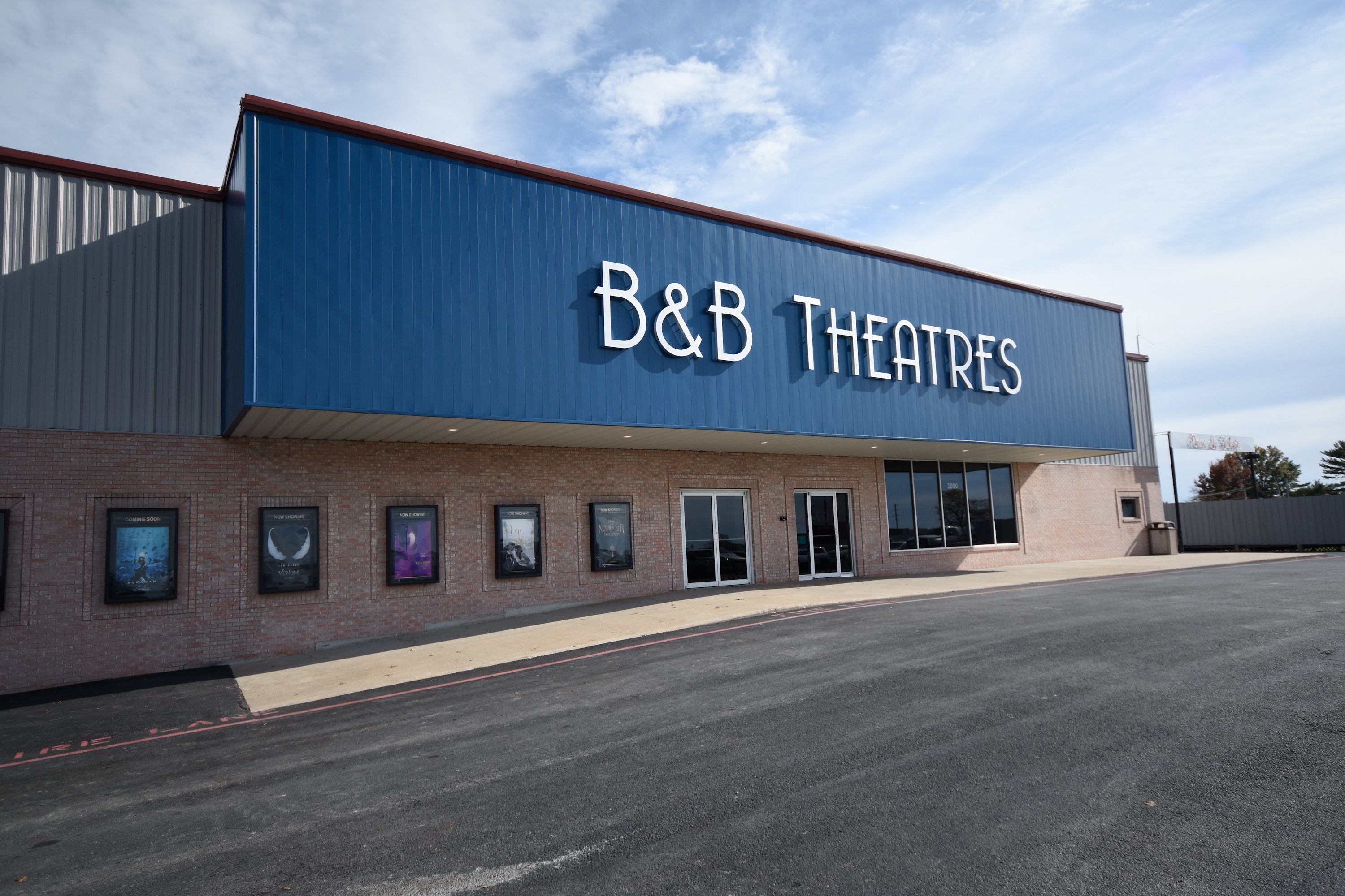 exterior of building with large white letters that reads: B&B THEATRES