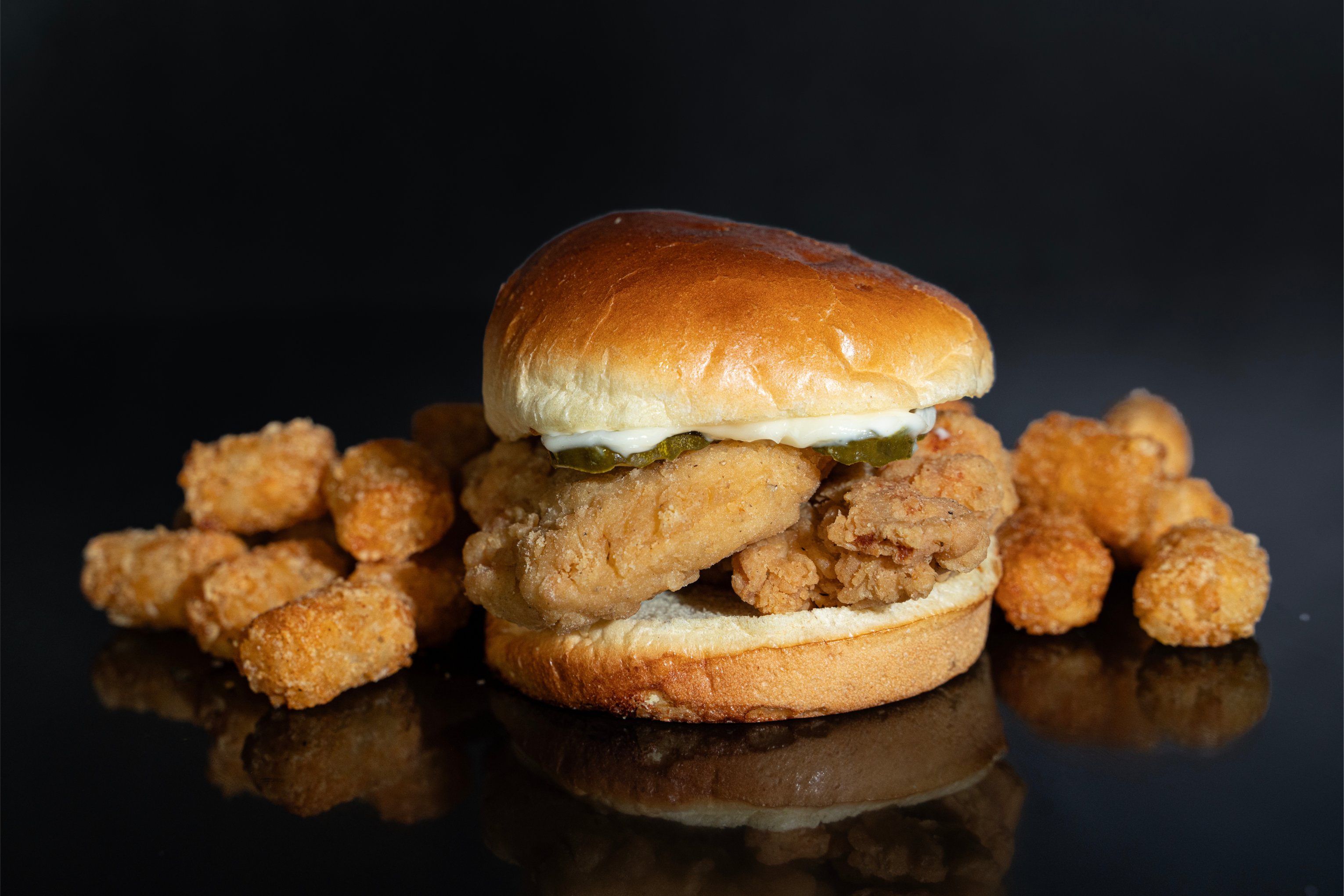 chicken tender sandwich with tots