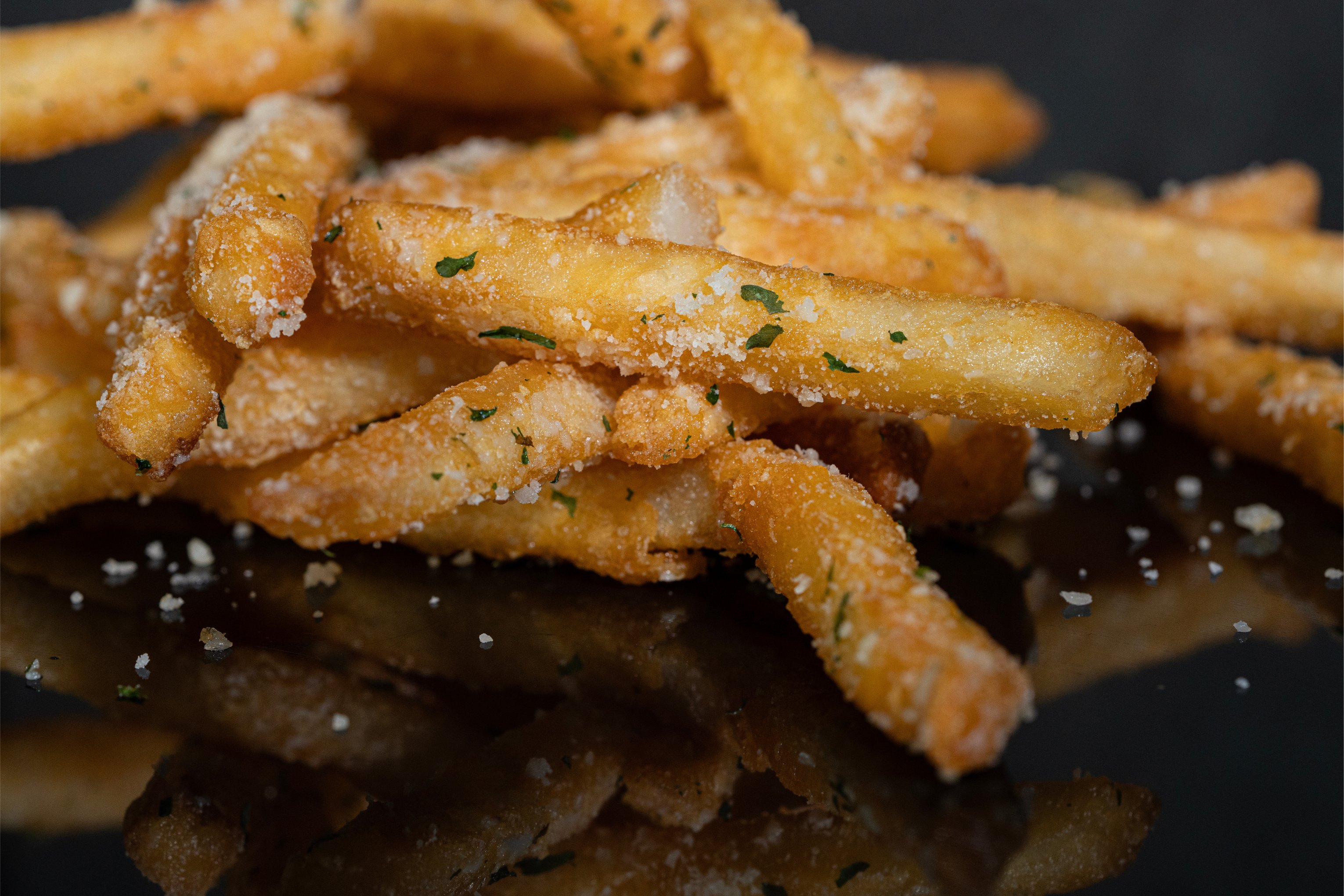 close up of garlic parm fries