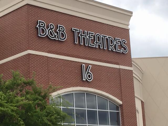 exterior of building. Big text reads: B&B THEATRES 16