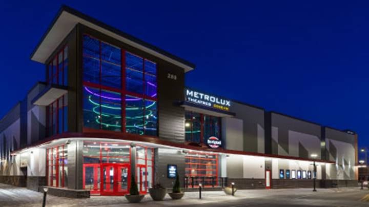 metro lux dine in view of theater from the outside at night