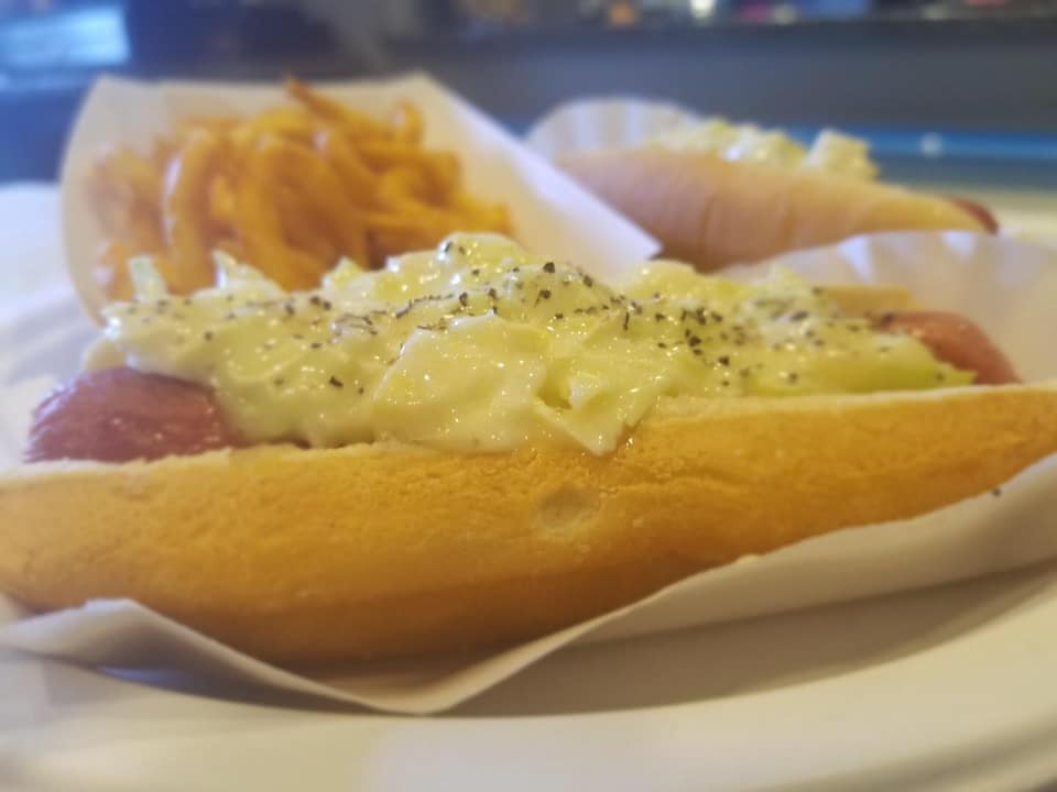 Slaw dog with Curly Fries